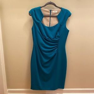 Calvin Klein turquoise cocktail dress in size 10, beautiful neckline!